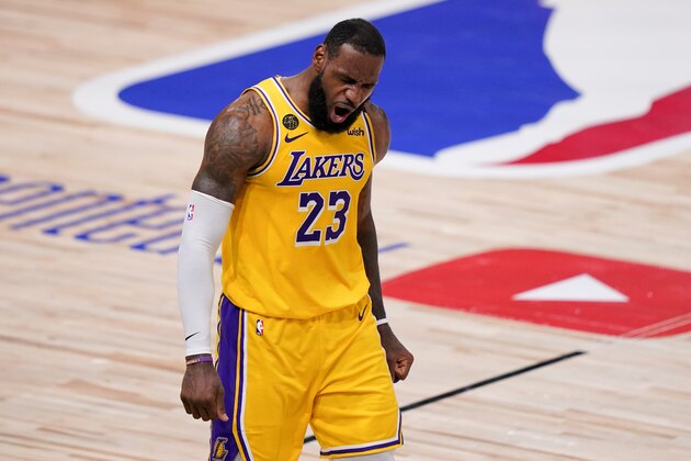 Los Angeles Lakers forward LeBron James celebrates during the second half in Game 4 of basketball's NBA Finals against the Miami Heat Tuesday, Oct. 6, 2020, in Lake Buena Vista, Fla. (AP Photo/Mark J. Terrill) Los Angeles Lakers forward LeBron James celebrates during the second half in Game 4 of basketball's NBA Finals against the Miami Heat Tuesday, Oct. 6, 2020, in Lake Buena Vista, Fla. (AP Photo/Mark J. Terrill)