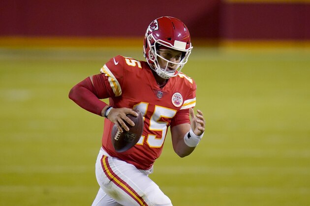 Kansas City Chiefs quarterback Patrick Mahomes runs with the ball during the second half of an NFL football game against the New England Patriots Monday, Oct. 5, 2020, in Kansas City, Mo. (AP Photo/Jeff Roberson)