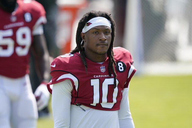 Arizona Cardinals wide receiver DeAndre Hopkins (10) heads back to the tunnel following warm ups before the start of an NFL football game against the Carolina Panthers Sunday, Oct. 4, 2020, in Charlotte, N.C. (AP Photo/Brian Blanco)