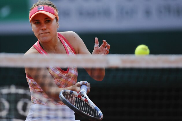 Sofia Kenin of the U.S. plays a shot against Danielle Collins of the U.S. in the quarterfinal match of the French Open tennis tournament at the Roland Garros stadium in Paris, France, Wednesday, Oct. 7, 2020. (AP Photo/Christophe Ena)