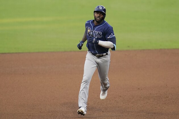 Tampa Bay Rays' Randy Arozarena runs around the bases after hitting a home run against the New York Yankees during the fifth inning in Game 3 of a baseball American League Division Series, Wednesday, Oct. 7, 2020, in San Diego. (AP Photo/Gregory Bull)