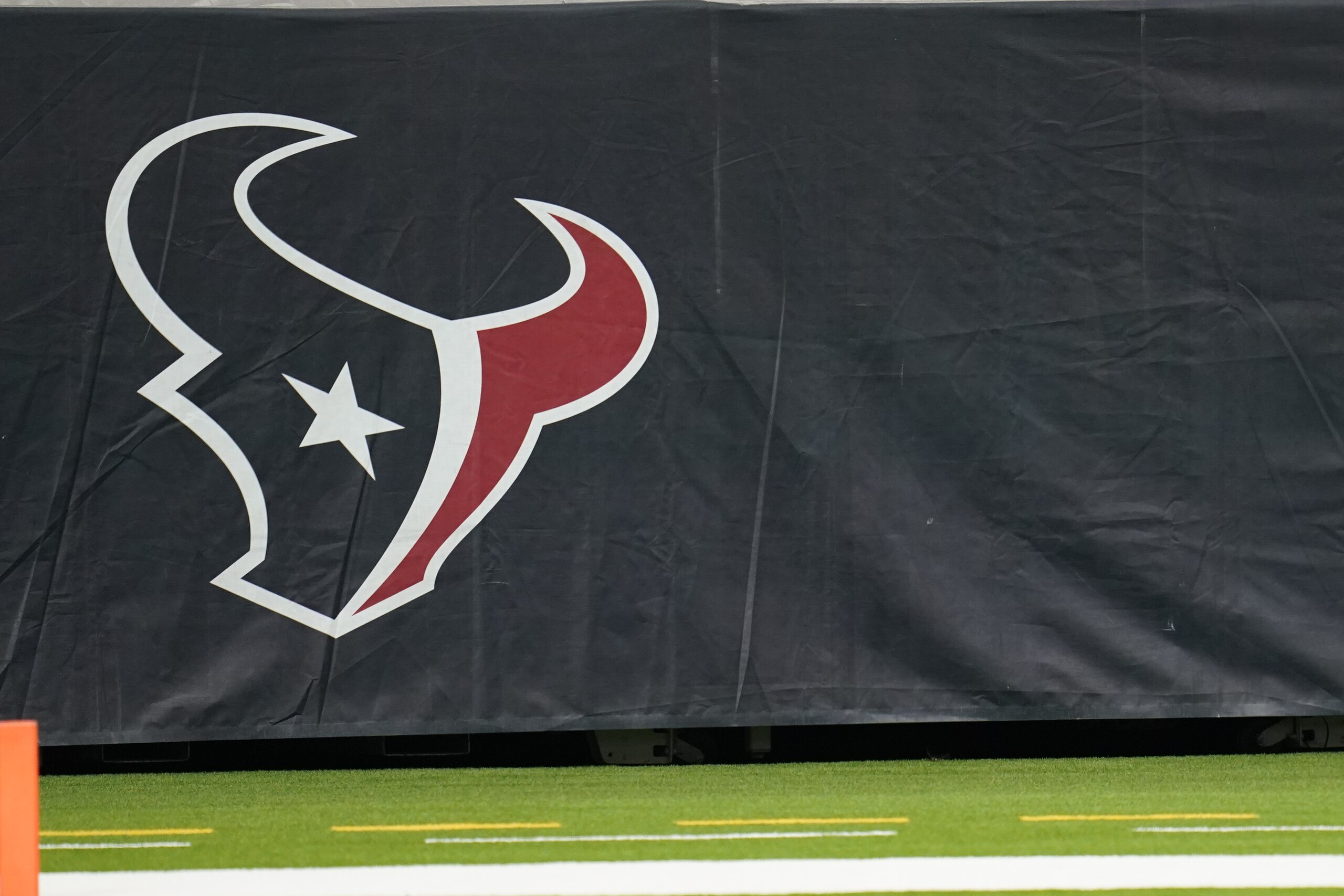 The Houston Texans logo is seen on the site of the stands during an NFL football game against the Baltimore Ravens, Sunday, Sept. 20, 2020, in Houston. (AP Photo/Matt Patterson)