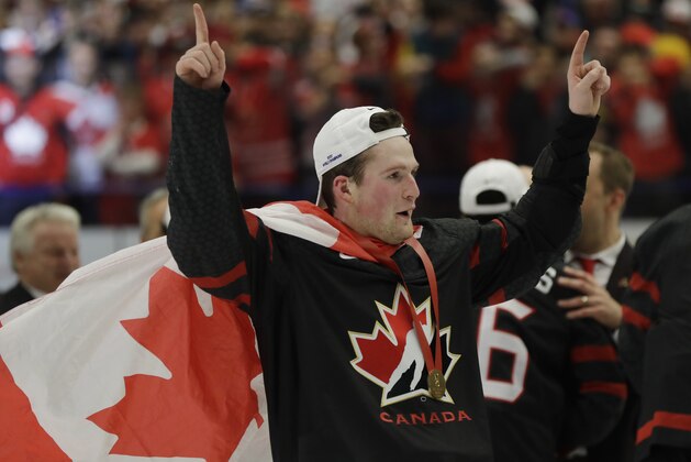 Canada's Alexis Lafreniere celebrates after winning the U20 Ice Hockey Worlds gold medal match between Canada and Russia in Ostrava, Czech Republic, Sunday, Jan. 5, 2020. (AP Photo/Petr David Josek)