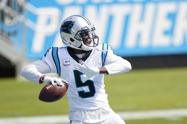 Carolina Panthers quarterback Teddy Bridgewater (5) warms up before the start of an NFL football game against the Arizona Cardinals Sunday, Oct. 4, 2020, in Charlotte, N.C. (AP Photo/Brian Blanco)