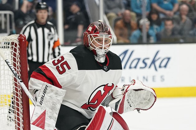 New Jersey Devils goaltender Cory Schneider (35) against the San Jose Sharks during the first period of an NHL hockey game Thursday, Feb. 27, 2020, in San Jose, Calif. (AP Photo/Tony Avelar) New Jersey Devils goaltender Cory Schneider (35) against the San Jose Sharks during the first period of an NHL hockey game Thursday, Feb. 27, 2020, in San Jose, Calif. (AP Photo/Tony Avelar)