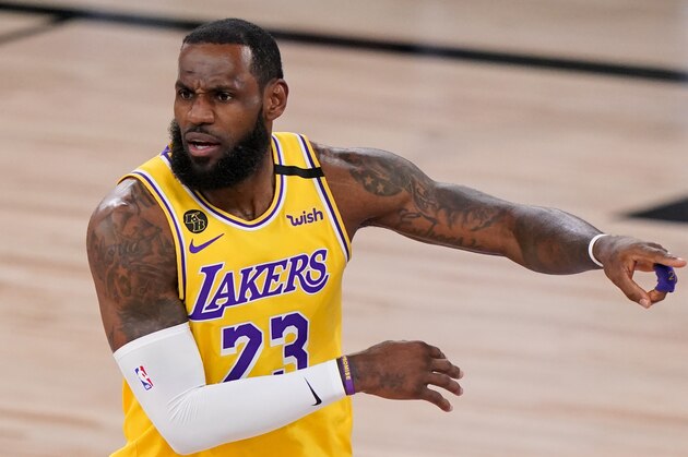 Los Angeles Lakers forward LeBron James plays against the Miami Heat during the second half in Game 4 of basketball's NBA Finals Tuesday, Oct. 6, 2020, in Lake Buena Vista, Fla. (AP Photo/Mark J. Terrill)