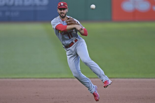 St. Louis Cardinals' Paul DeJong throws to first to get out Pittsburgh Pirates' Josh Bell during the seventh inning of a baseball game, Sunday, Sept. 20, 2020, in Pittsburgh.  (AP Photo/David Dermer)