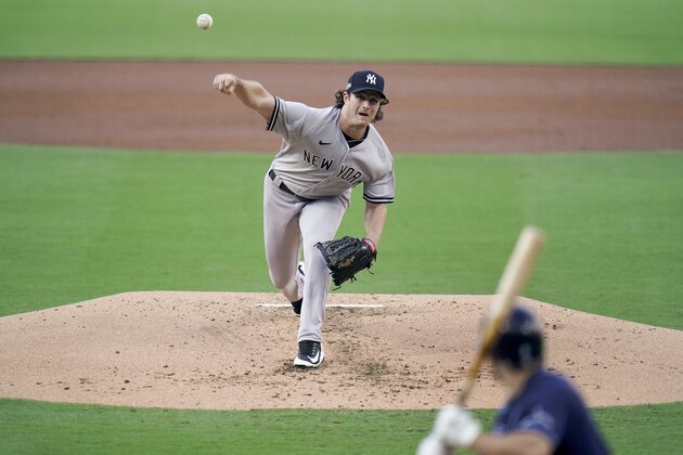 New York Yankees pitcher Gerrit Cole delivers against the Tampa Bay Rays during the first inning in Game one of a baseball American League Division Series Monday, Oct. 5, 2020, in San Diego. (AP Photo/Jae C. Hong)
