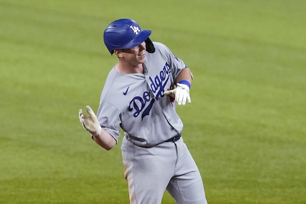 Los Angeles Dodgers' Will Smith gestures as he celebrates after his two-RBI double, his fifth hit of the game, against the San Diego Padres during the ninth inning in Game 3 of a baseball National League Division Series Thursday, Oct. 8, 2020, in Arlington, Texas. (AP Photo/Tony Gutierrez) Los Angeles Dodgers' Will Smith gestures as he celebrates after his two-RBI double, his fifth hit of the game, against the San Diego Padres during the ninth inning in Game 3 of a baseball National League Division Series Thursday, Oct. 8, 2020, in Arlington, Texas. (AP Photo/Tony Gutierrez)