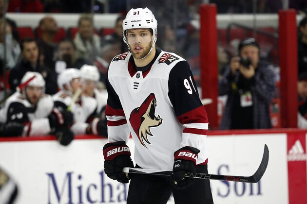 Arizona Coyotes' Taylor Hall (91) waits for a face-off against the Carolina Hurricanes during the second period of an NHL hockey game in Raleigh, N.C., Friday, Jan. 10, 2020. (AP Photo/Karl B DeBlaker)