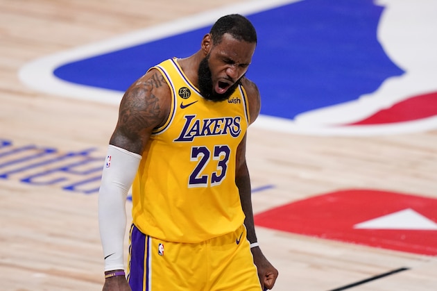 Los Angeles Lakers forward LeBron James celebrates during the second half in Game 4 of basketball's NBA Finals against the Miami Heat Tuesday, Oct. 6, 2020, in Lake Buena Vista, Fla. (AP Photo/Mark J. Terrill)