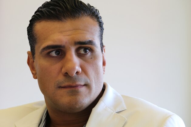 In this April 2, 2013 photo, Mexican Lucha Libre wrestler Alberto del Rio poses for a portrait in New York.  Del Rio is a Mexican wrestler who confronted Jack Swagger, who played the role of an American who does not like immigrants living illegally in the US, on Sunday in a fight at the WWE Wrestlemania 29 wrestling event in New Jersey, the biggest WWE event of the year.  The immigration storyline helps WWE, or Lucha Libre USA, attract Latino audiences to their fights. (AP Photo/Peter Morgan)