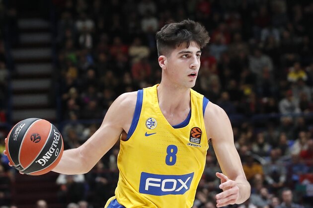 Maccabi Fox Tel Aviv's Deni Avdija controls the ball during the Euro League basketball match between Olimpia Milan and Maccabi Fox Tel Aviv, in Milan, Italy, Tuesday, Nov. 19, 2019. (AP Photo/Antonio Calanni)
