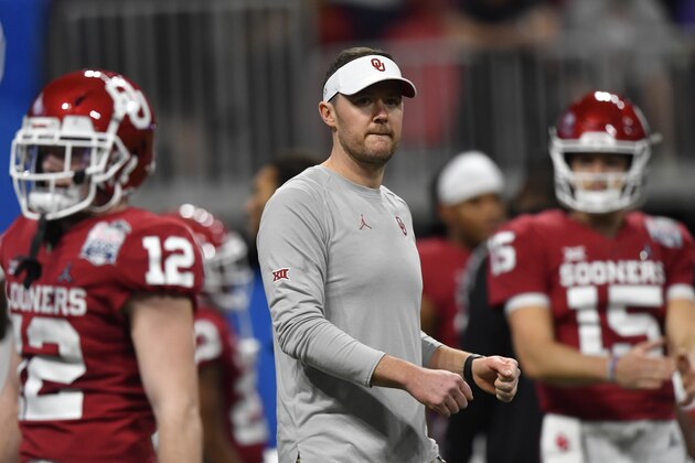 FILE - In this Saturday, Dec. 28, 2019, file photo, Oklahoma head coach Lincoln Riley speaks with his team before the first half of the Peach Bowl NCAA semifinal college football playoff game against LSU, in Atlanta. Riley already has coached Heisman Trophy winners Baker Mayfield and Kyler Murray along with Heisman runner-up Jalen Hurts. Now, he is hoping to build a new tradition at Oklahoma - pulling top quarterbacks to Oklahoma from the high school ranks. Caleb Williams, the No. 1 quarterback in the 247Sports Class of 2021 and ESPN’s No. 1 dual-threat quarterback for that class, has committed to OKlahoma.(AP Photo/John Amis, File) FILE - In this Saturday, Dec. 28, 2019, file photo, Oklahoma head coach Lincoln Riley speaks with his team before the first half of the Peach Bowl NCAA semifinal college football playoff game against LSU, in Atlanta. Riley already has coached Heisman Trophy winners Baker Mayfield and Kyler Murray along with Heisman runner-up Jalen Hurts. Now, he is hoping to build a new tradition at Oklahoma - pulling top quarterbacks to Oklahoma from the high school ranks. Caleb Williams, the No. 1 quarterback in the 247Sports Class of 2021 and ESPN’s No. 1 dual-threat quarterback for that class, has committed to OKlahoma.(AP Photo/John Amis, File)