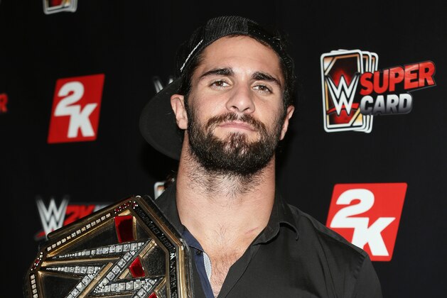IMAGE DISTRIBUTED FOR 2K - WWE World Heavyweight Champion Seth Rollins poses with his championship title at the WWE 2K SummerSlam Kickoff in New York, N.Y., on Thursday, Aug. 20, 2015. (Photo by Stuart Ramson/Invision for 2K/AP Images) IMAGE DISTRIBUTED FOR 2K - WWE World Heavyweight Champion Seth Rollins poses with his championship title at the WWE 2K SummerSlam Kickoff in New York, N.Y., on Thursday, Aug. 20, 2015. (Photo by Stuart Ramson/Invision for 2K/AP Images)