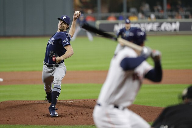 Tampa Bay Rays starting pitcher Tyler Glasnow (20) delivers a pitch against the Houston Astros during the first inning of Game 5 of a baseball American League Division Series in Houston, Thursday, Oct. 10, 2019. (AP Photo/Eric Gay)
