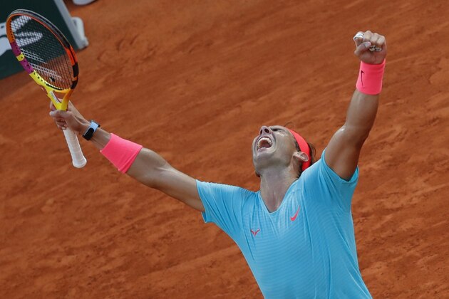Spain's Rafael Nadal celebrates winning the semifinal match of the French Open tennis tournament against Argentina's Diego Schwartzman in three sets, 6-3, 6-3, 7-6, at the Roland Garros stadium in Paris, France, Friday, Oct. 9, 2020. (AP Photo/Christophe Ena) Spain's Rafael Nadal celebrates winning the semifinal match of the French Open tennis tournament against Argentina's Diego Schwartzman in three sets, 6-3, 6-3, 7-6, at the Roland Garros stadium in Paris, France, Friday, Oct. 9, 2020. (AP Photo/Christophe Ena)