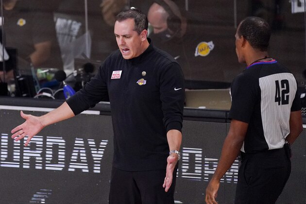 Los Angeles Lakers head coach Frank Vogel yells to referee Eric Lewis (42) during the second half in Game 5 of basketball's NBA Finals Friday, Oct. 9, 2020, in Lake Buena Vista, Fla. (AP Photo/Mark J. Terrill) Los Angeles Lakers head coach Frank Vogel yells to referee Eric Lewis (42) during the second half in Game 5 of basketball's NBA Finals Friday, Oct. 9, 2020, in Lake Buena Vista, Fla. (AP Photo/Mark J. Terrill)