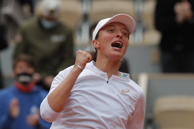 Poland's Iga Swiatek celebrates winning the final match of the French Open tennis tournament against Sofia Kenin of the U.S. in two sets, 6-4, 6-1, at the Roland Garros stadium in Paris, France, Saturday, Oct. 10, 2020. (AP Photo/Michel Euler) Poland's Iga Swiatek celebrates winning the final match of the French Open tennis tournament against Sofia Kenin of the U.S. in two sets, 6-4, 6-1, at the Roland Garros stadium in Paris, France, Saturday, Oct. 10, 2020. (AP Photo/Michel Euler)