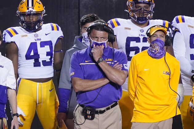 LSU head coach Ed Orgeron watches from the sideline in the second half of an NCAA college football game against Vanderbilt Saturday, Oct. 3, 2020, in Nashville, Tenn. LSU won 41-7. (AP Photo/Mark Humphrey) LSU head coach Ed Orgeron watches from the sideline in the second half of an NCAA college football game against Vanderbilt Saturday, Oct. 3, 2020, in Nashville, Tenn. LSU won 41-7. (AP Photo/Mark Humphrey)