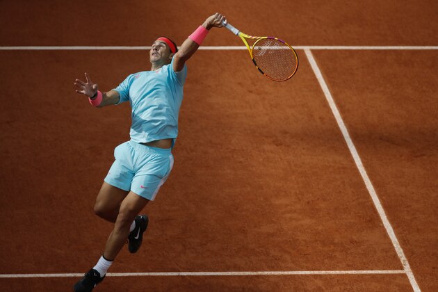 Spain's Rafael Nadal plays a shot against Argentina's Diego Schwartzman in the semifinal match of the French Open tennis tournament at the Roland Garros stadium in Paris, France, Friday, Oct. 9, 2020. (AP Photo/Christophe Ena)