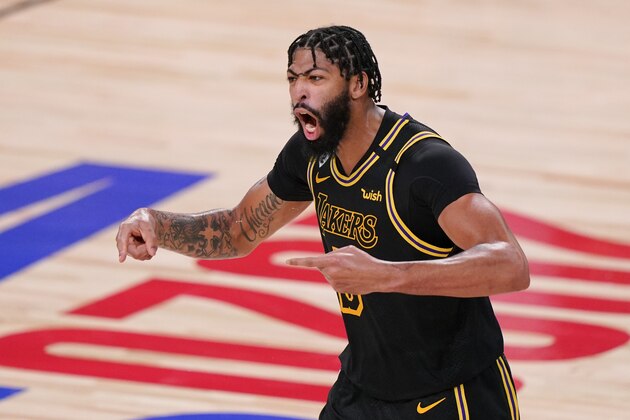 Los Angeles Lakers forward Anthony Davis celebrated during the second half in Game 5 of basketball's NBA Finals against the Miami Heat Friday, Oct. 9, 2020, in Lake Buena Vista, Fla. (AP Photo/Mark J. Terrill)