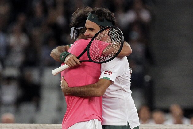 Roger Federer, right, and Rafael Nadal embrace after the final point of their exhibition tennis match held at the Cape Town Stadium in Cape Town, South Africa, Friday Feb. 7, 2020. (AP Photo/Halden Krog) Roger Federer, right, and Rafael Nadal embrace after the final point of their exhibition tennis match held at the Cape Town Stadium in Cape Town, South Africa, Friday Feb. 7, 2020. (AP Photo/Halden Krog)