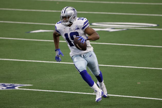 Dallas Cowboys wide receiver Amari Cooper (19) gains yardage after catching a pass for a first down in the second half of an NFL football game against the Cleveland Browns in Arlington, Texas, Sunday, Oct. 4, 2020. (AP Photo/Ron Jenkins)