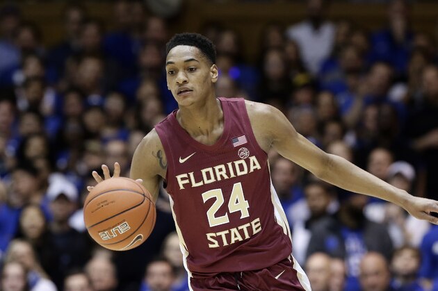 Florida State guard Devin Vassell (24) dribbles against Duke during the first half of an NCAA college basketball game in Durham, N.C., Monday, Feb. 10, 2020. (AP Photo/Gerry Broome)