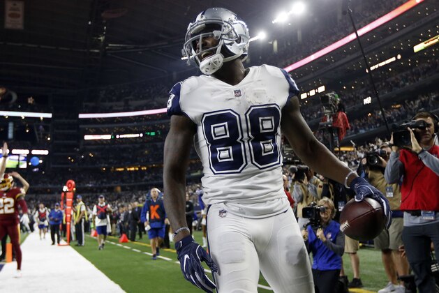 Dallas Cowboys wide receiver Dez Bryant (88) smiles after catching a touchdown pass in the second half of an NFL football game against the Washington Redskins on Thursday, Nov. 30, 2017, in Arlington, Texas. (AP Photo/Ron Jenkins)