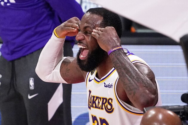 Los Angeles Lakers' LeBron James (23) celebrates after the Lakers defeated the Miami Heat 103-88 in Game 6 of basketball's NBA Finals Sunday, Oct. 11, 2020, in Lake Buena Vista, Fla. (AP Photo/Mark J. Terrill)