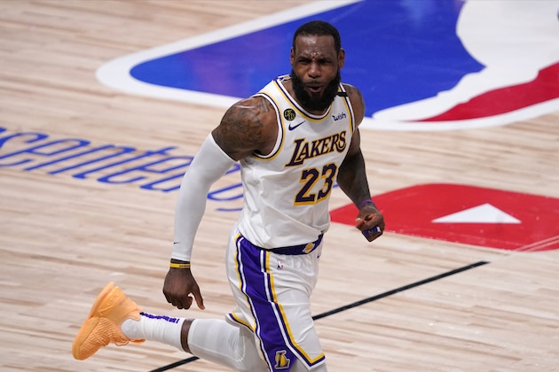 Los Angeles Lakers' LeBron James (23) celebrates during the second half in Game 6 of basketball's NBA Finals against Miami Heat Sunday, Oct. 11, 2020, in Lake Buena Vista, Fla. The Lakers defeated the Miami Heat 103-88. (AP Photo/Mark J. Terrill)