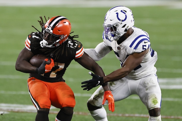 Cleveland Browns running back Kareem Hunt (27) spins away from Indianapolis Colts middle linebacker Anthony Walker (54) during the second half of an NFL football game, Sunday, Oct. 11, 2020, in Cleveland. (AP Photo/Ron Schwane)