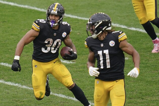 Pittsburgh Steelers running back James Conner (30) and wide receiver Chase Claypool (11) plat\y against the Philadelphia Eagles during an NFL football game, Sunday, Oct. 11, 2020, in Pittsburgh. (AP Photo/Keith Srakocic)