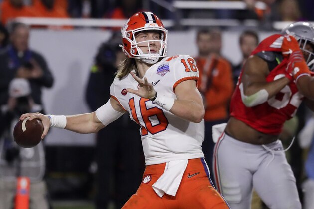 Clemson quarterback Trevor Lawrence throws a pass against Ohio State during the second half of the Fiesta Bowl NCAA college football playoff semifinal Saturday, Dec. 28, 2019, in Glendale, Ariz. (AP Photo/Rick Scuteri)