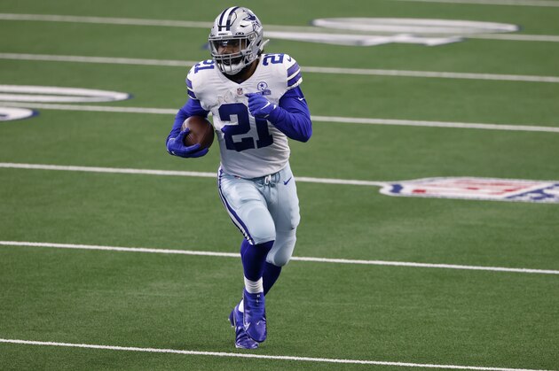 Dallas Cowboys running back Ezekiel Elliott (21) runs the ball against the New York Giants in the first half of an NFL football game in Arlington, Texas, Sunday, Oct. 11, 2020. (AP Photo/Ron Jenkins)