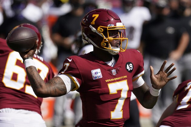 Washington Football Team quarterback Dwayne Haskins (7) tosses a pass during the first half of the Baltimore Ravens Washington Football team NFL football game Sunday, Oct. 4, 2020, in Landover, Md. (AP Photo/Steve Helber)