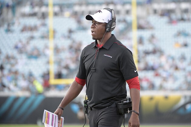 FILE - In this Aug. 29, 2019, file photo, Atlanta Falcons' Raheem Morris watches from the sideline during the first half of a preseason NFL football game against the Jacksonville Jaguars, in Jacksonville, Fla. Morris is returning to his roots as a defensive coach. The Falcons hope the move will help save their season. After 3½ seasons working with the receivers on the offensive side, Morris is now in charge of the struggling secondary.  “You do whatever is required for the team,’” Morris said. (AP Photo/Phelan M. Ebenhack, File)