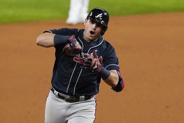 Atlanta Braves' Austin Riley rounds the bases after a run home against the Los Angeles Dodgers during the ninth inning in Game 1 of a baseball National League Championship Series Monday, Oct. 12, 2020, in Arlington, Texas. (AP Photo/Tony Gutierrez)