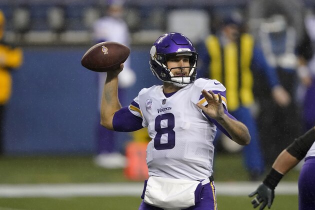 Minnesota Vikings quarterback Kirk Cousins passes against the Seattle Seahawks during the first half of an NFL football game, Sunday, Oct. 11, 2020, in Seattle. (AP Photo/Ted S. Warren)
