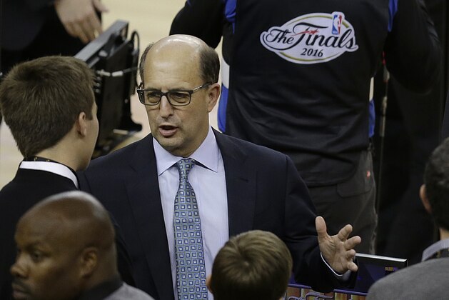 FILE - In this June 2, 2016, file photo, television announcer Jeff Van Gundy speaks before Game 1 of basketball's NBA Finals between the Golden State Warriors and the Cleveland Cavaliers,  in Oakland, Calif. Former NBA coach Jeff Van Gundy will lead the U.S. men’s basketball team through the early stages of qualifying for the 2019 Basketball World Cup. He will guide a team made up of mostly NBA G League players in this summer’s FIBA AmeriCup 2017 tournament and in qualifying games between November and September 2018. USA Basketball announced Van Gundy’s appointment Wednesday, July 5, 2017. (AP Photo/Ben Margot, File)