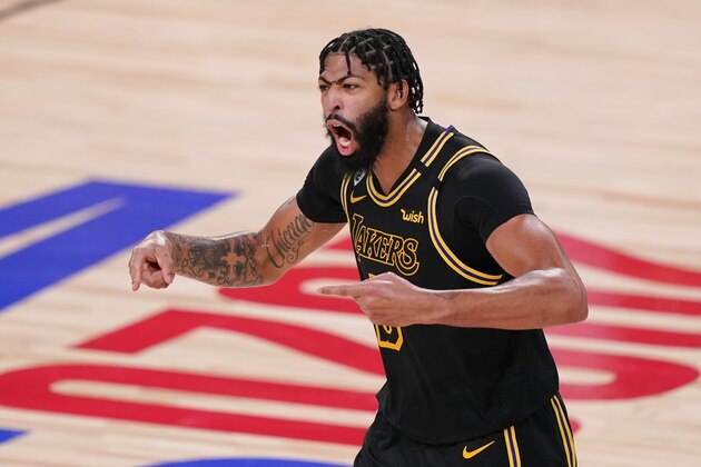 Los Angeles Lakers forward Anthony Davis celebrated during the second half in Game 5 of basketball's NBA Finals against the Miami Heat Friday, Oct. 9, 2020, in Lake Buena Vista, Fla. (AP Photo/Mark J. Terrill)
