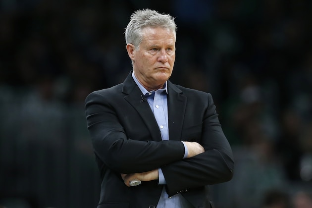 Philadelphia 76ers head coach Brett Brown watches play during the second half of an NBA basketball game against the Boston Celtics in Boston, Saturday, Feb. 1, 2020. (AP Photo/Michael Dwyer)