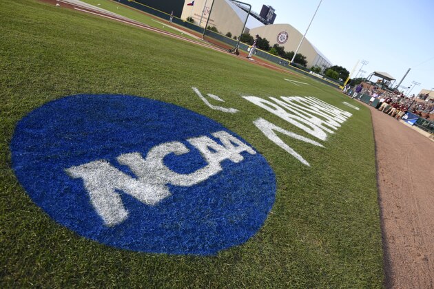The NCAA logo is painted alongside the visitor dugout at Olsen Field before the start of a NCAA college baseball super regional tournament game between TCU and Texas A&M, Friday, June 10, 2016, in College Station, Texas. TCU won game one of the series 8-2. (AP Photo/Sam Craft)