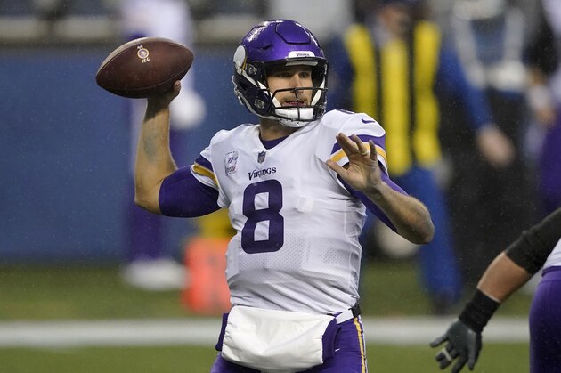 Minnesota Vikings quarterback Kirk Cousins passes against the Seattle Seahawks during the first half of an NFL football game, Sunday, Oct. 11, 2020, in Seattle. (AP Photo/Ted S. Warren)