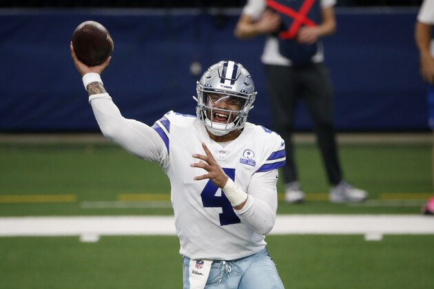 Dallas Cowboys quarterback Dak Prescott throws a pass in the first half of an NFL football game against the New York Giants in Arlington, Texas, Sunday, Oct. 11, 2020. (AP Photo/Michael Ainsworth)
