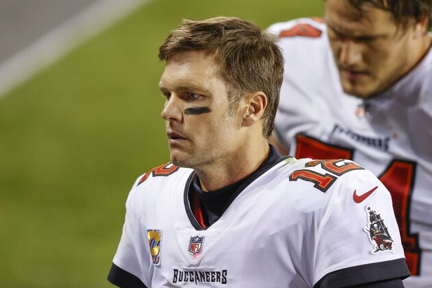 Tampa Bay Buccaneers quarterback Tom Brady (12) walks off the field after an NFL football game against the Chicago Bears, Thursday, Oct. 8, 2020, in Chicago. (AP Photo/Kamil Krzaczynski)