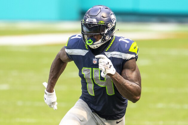 Seattle Seahawks wide receiver DK Metcalf (14) in action against the Miami Dolphins during an NFL football game, Sunday, Oct. 4, 2020, in Miami Gardens, Fla. (AP Photo/Doug Murray)