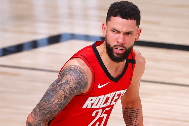 Houston Rockets' Austin Rivers reacts to his shot during the second quarter of Game 2 of an NBA basketball first-round playoff series against the Oklahoma City Thunder, Thursday, Aug. 20, 2020, in Lake Buena Vista, Fla. (Kevin C. Cox/Pool Photo via AP)