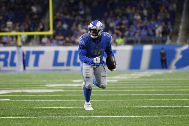Detroit Lions running back C.J. Anderson (26) runs the ball in the first half of an NFL preseason football game against the Buffalo Bills in Detroit, Friday, Aug. 23, 2019. (AP Photo/Rick Osentoski)